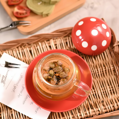 Glasteetasse mit Pilzdeckel